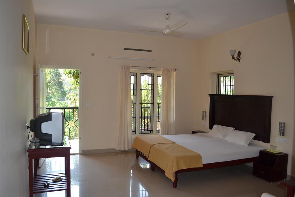 Kerala House Apartment Текади Екстериор снимка